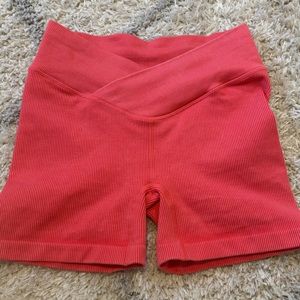 Bright pink workout shorts, size XS. Joy Lab brand from Target.